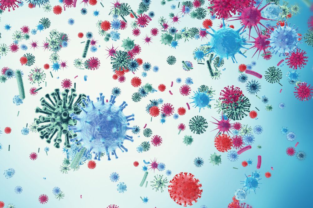 Illustrasjon av virus i mange ulike farger.